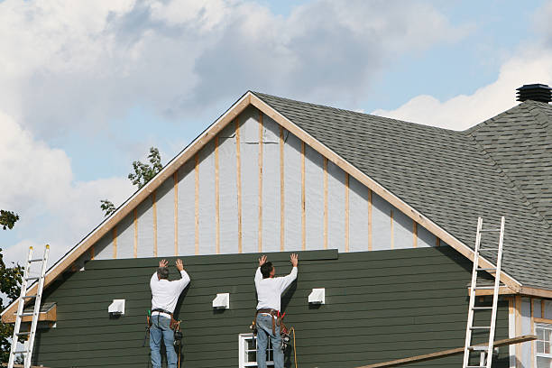 Professional Emergency Siding Repair technician working in Chandlersville, OH